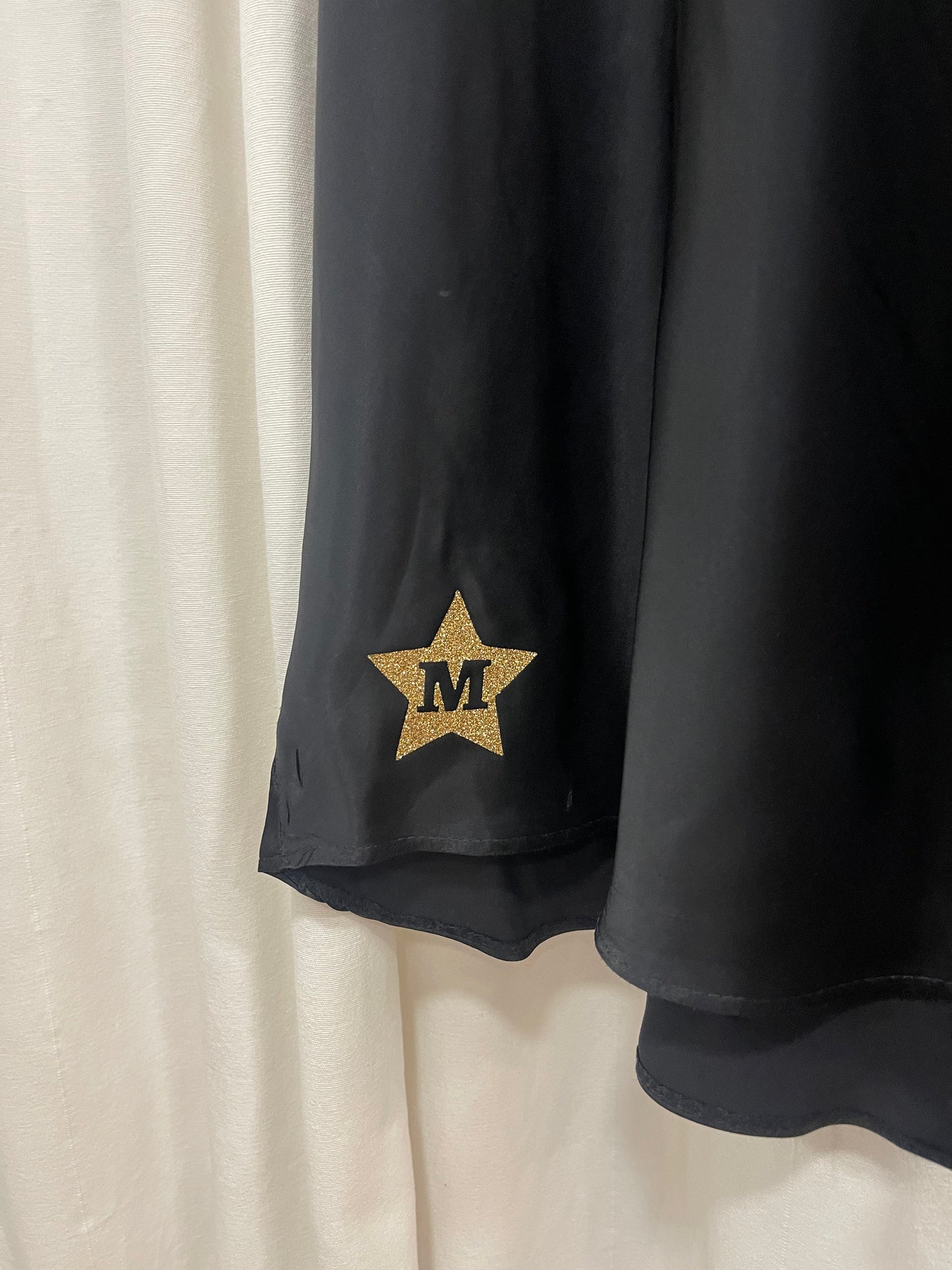 FALDA SATINADA NEGRA GOLDEN STAR